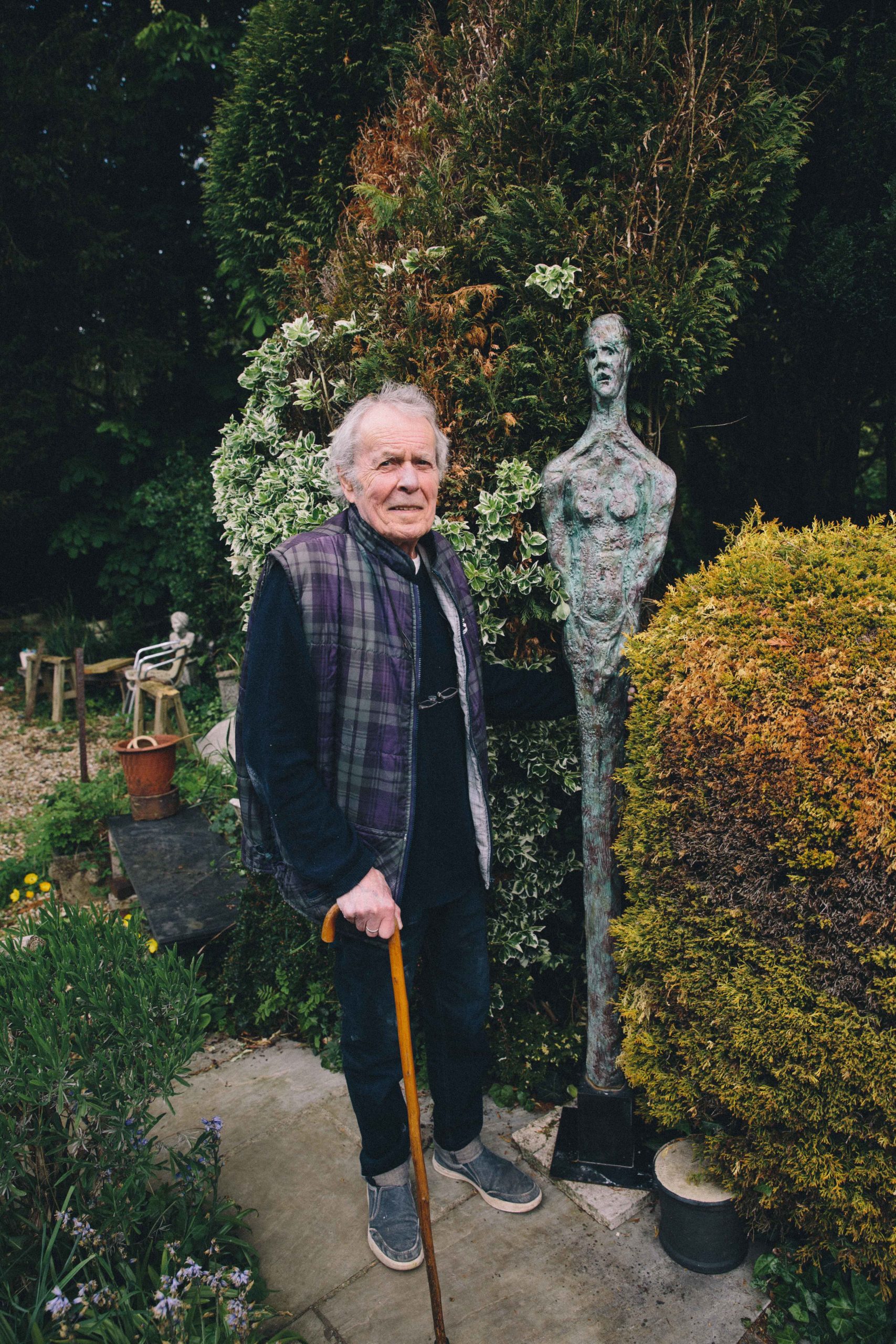 Ian Gregory with his bronze sculpture