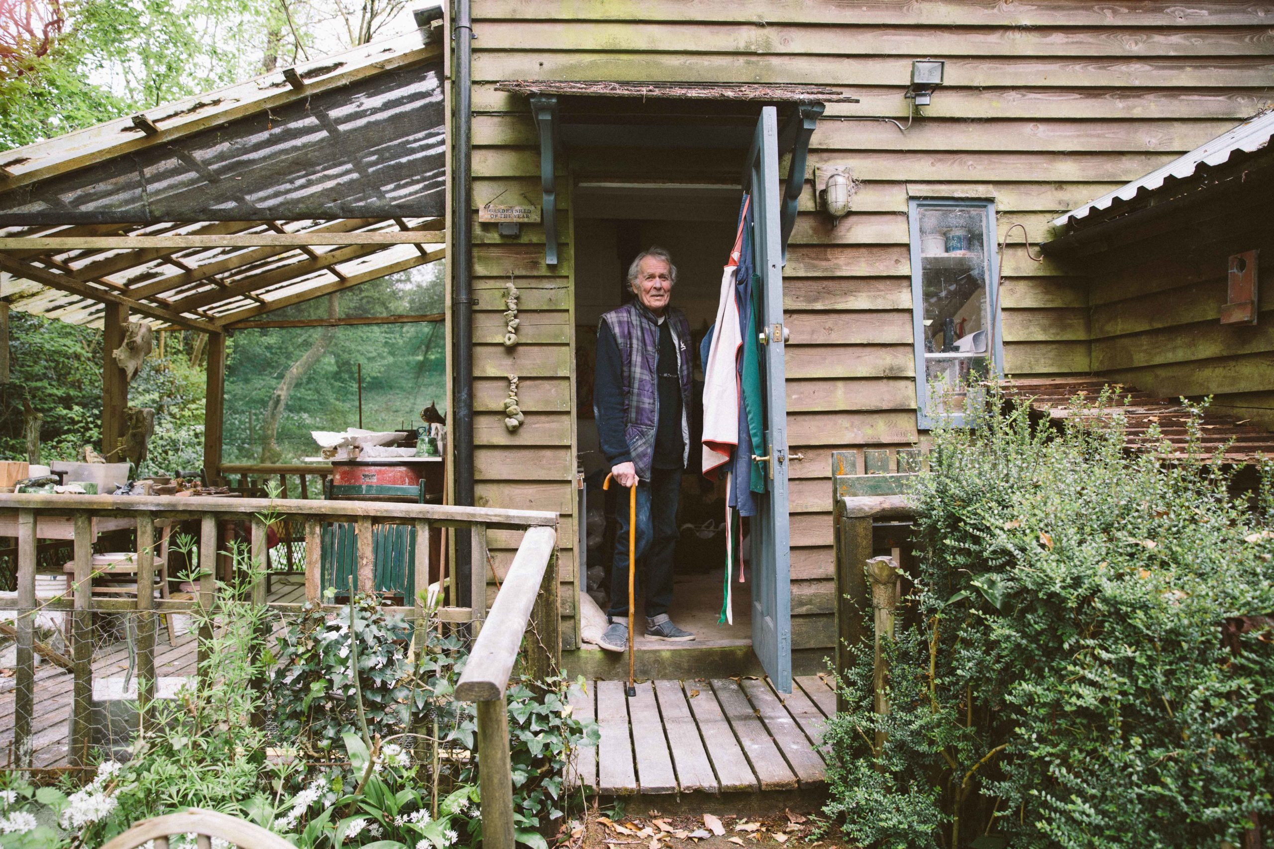 Ian Gregory in the doorway of his studio