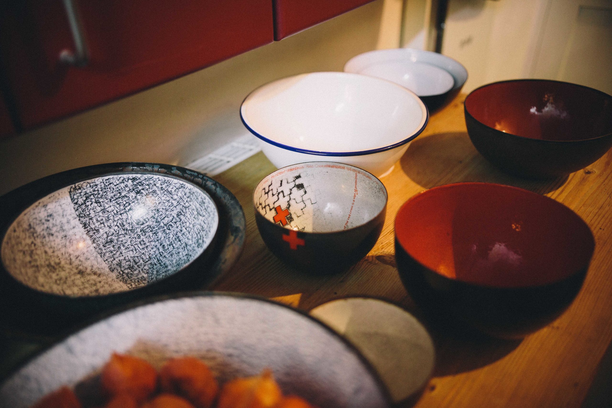 Elizabeth Turrell bowls, white, red and black