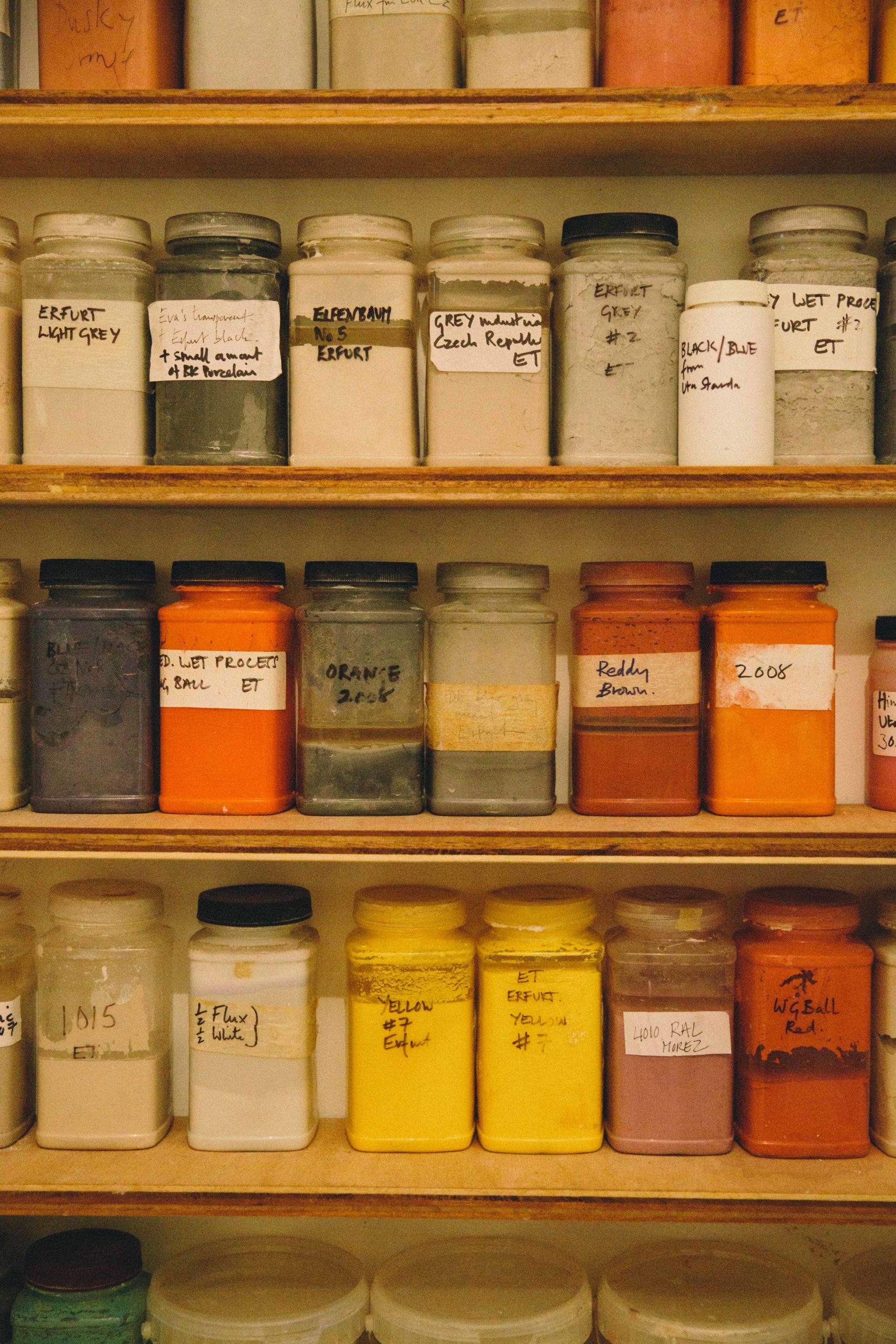 Pots of enamel powder