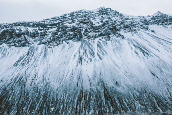 Cliff face covered with Snow